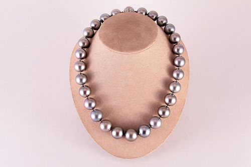 cartier tahitian pearl earrings
