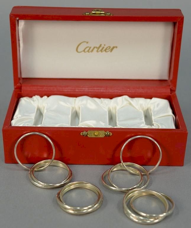 Four Cartier Trinity sterling silver 